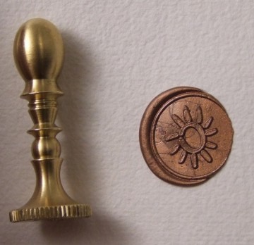 1120945 zegel messing zon